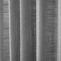 Photograph of a light grey woven fabric displaying prominent vertical pleats with visible coarse texture and subtle shifts in monochromatic tone