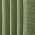Green Liz linen curtains in a close room detail highlighting the linen texture and colour