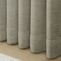 Grey Liz Linen Pleated Curtains rounded curtain hems above a pale wood floor