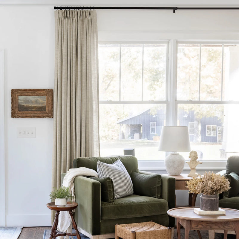 Grey Beige Liz Linen Pleated Curtains beside a green sofa and dried-flower coffee-table arrangement