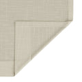 Photograph of a light beige linen-look fabric with a subtle grid weave texture, folded in the lower right corner revealing the clean edge and reverse side