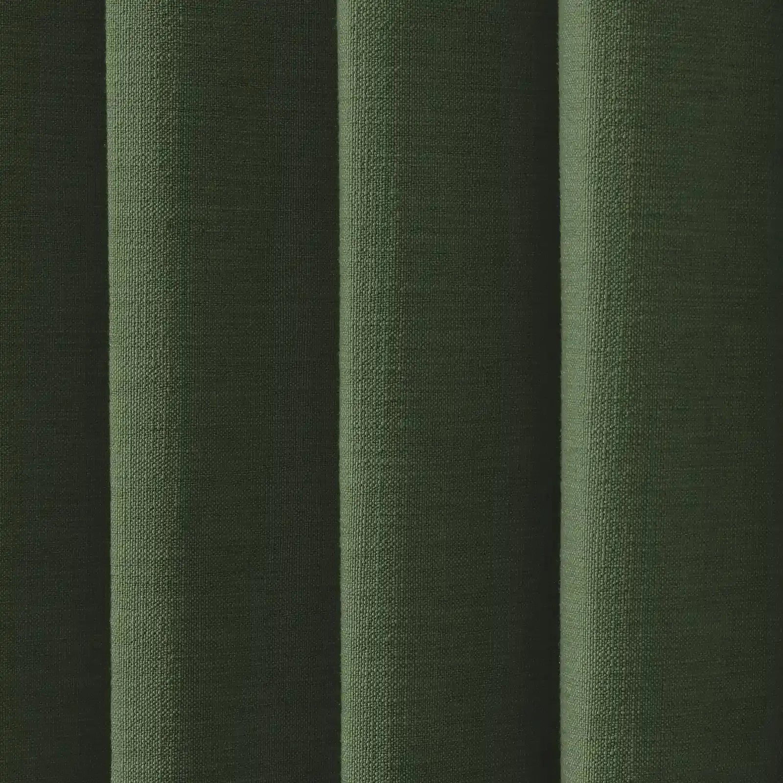 Photograph of deep olive green textured fabric with prominent vertical folds and a granular weave pattern
