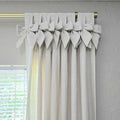 Close-up view of the tie-top header on the Jawara curtains.