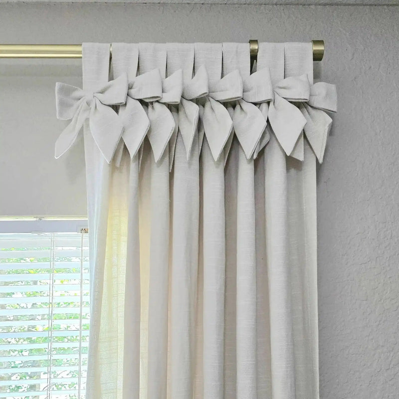 Close-up view of the tie-top header on the Jawara curtains.