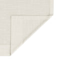 Off-white textured woven fabric with a subtle grid pattern, folded at the bottom right corner against a plain white background