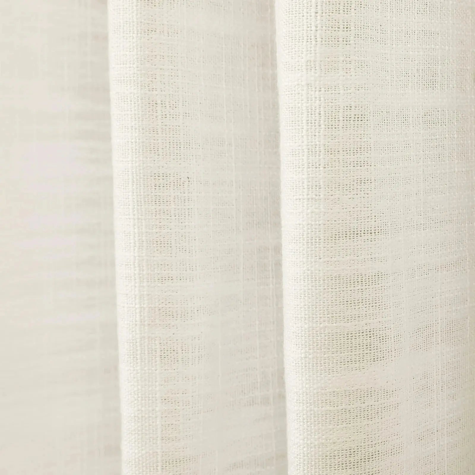 White textured linen fabric featuring a distinct open weave pattern and elegant soft vertical drapes