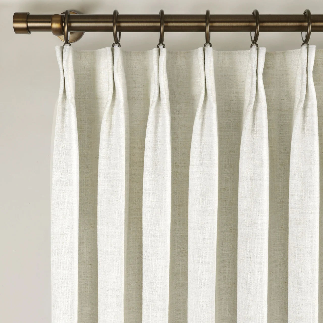 Ivory White Liz Linen Pleated Curtains triple pinch pleat heading on a bronze curtain rod
