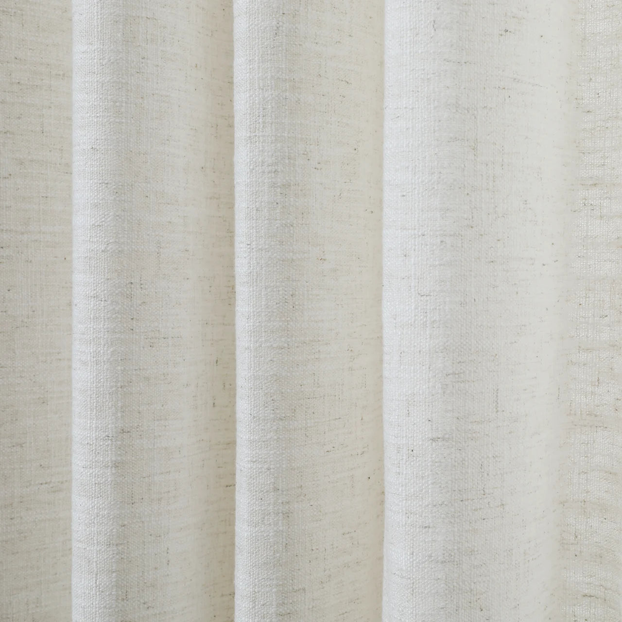 Ivory White Liz Linen Pleated Curtains semi-sheer linen weave shown in vertical folds