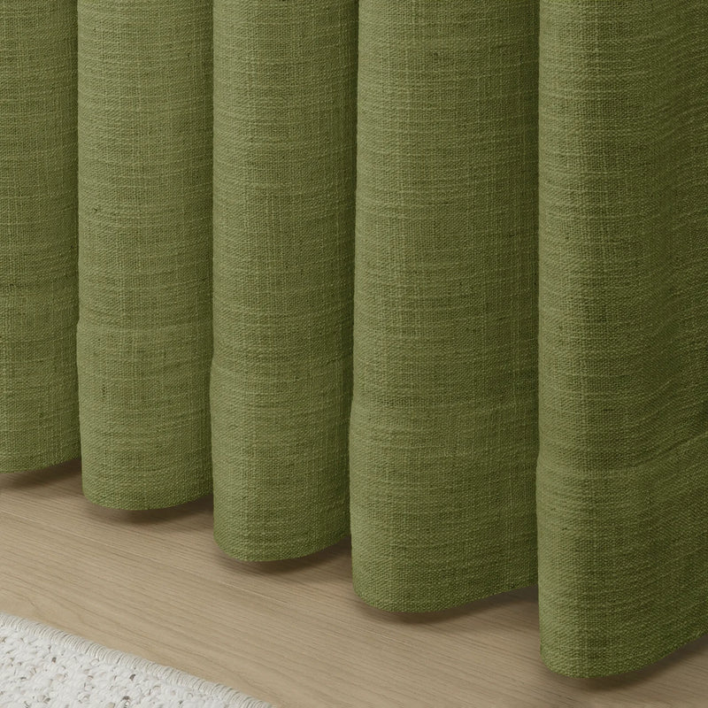 Jade Green Olive Liz linen curtains showing the lower drape and pooling folds near the floor