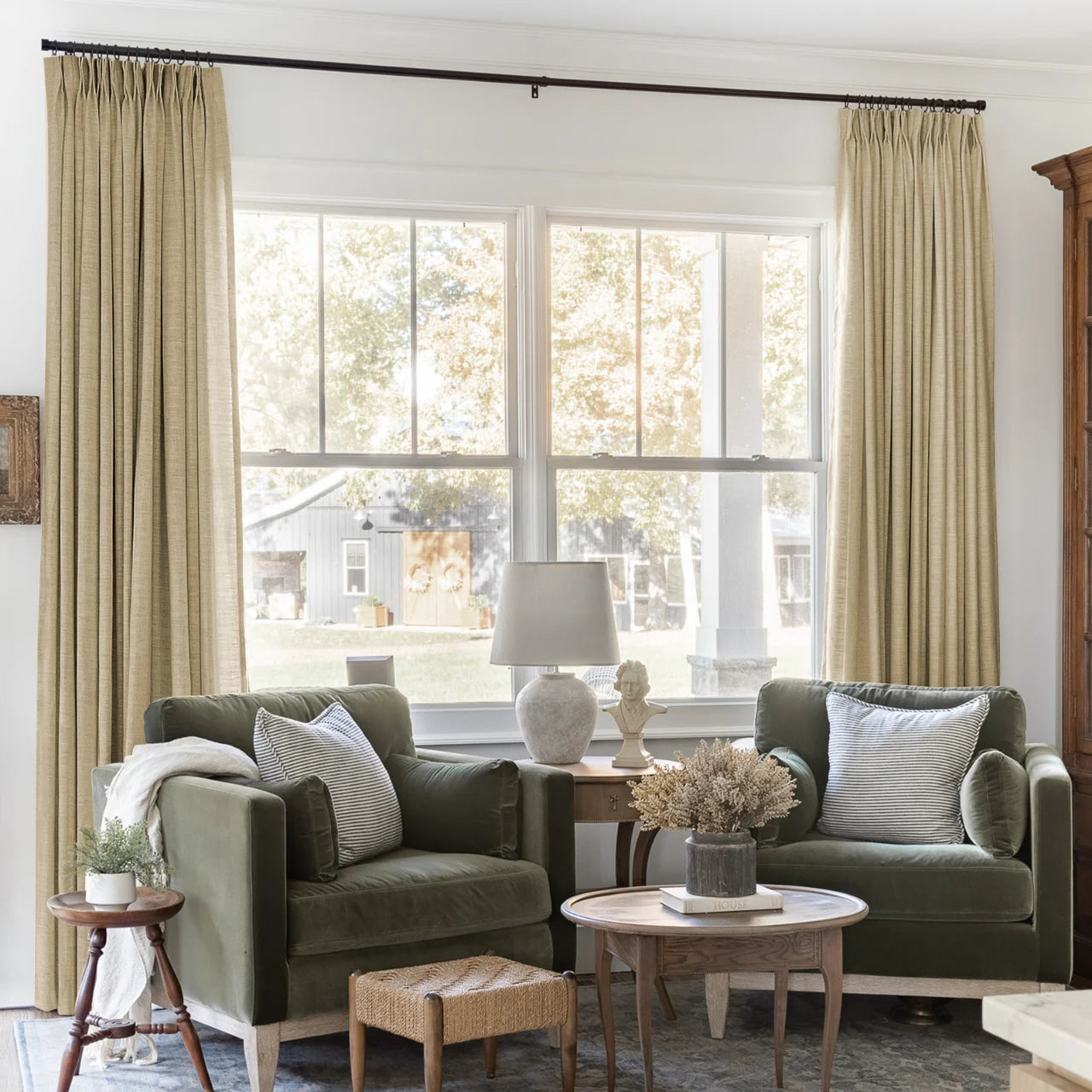 Khaki Yellow Liz linen curtains framing a bright window in a balanced full-length interior view