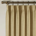 Khaki Yellow Liz linen curtains showing the lower drape and pooling folds near the floor