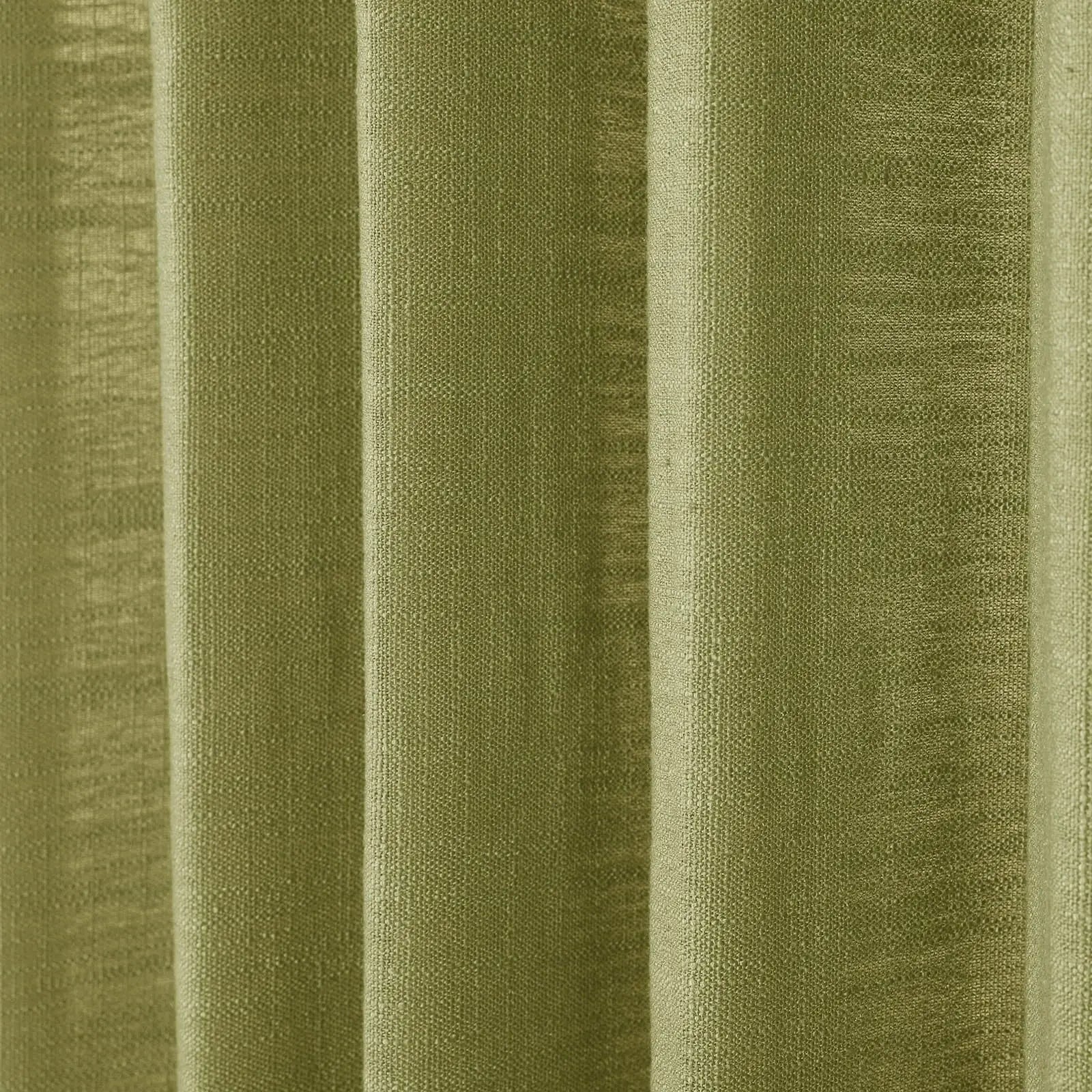 Photograph of olive green woven fabric curtains showcasing soft vertical folds and prominent linen-like texture