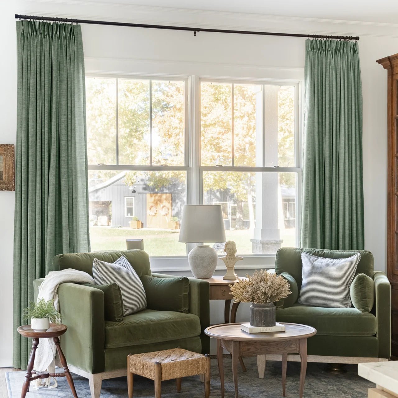 Lagoon Liz linen curtains framing a bright window in a balanced full-length interior view