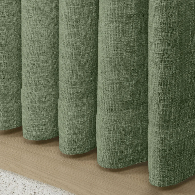 Lagoon Liz linen curtains in a close room detail highlighting the linen texture and colour