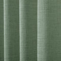 Lagoon Liz linen curtains drawn partly across the window with filtered light revealing the weave