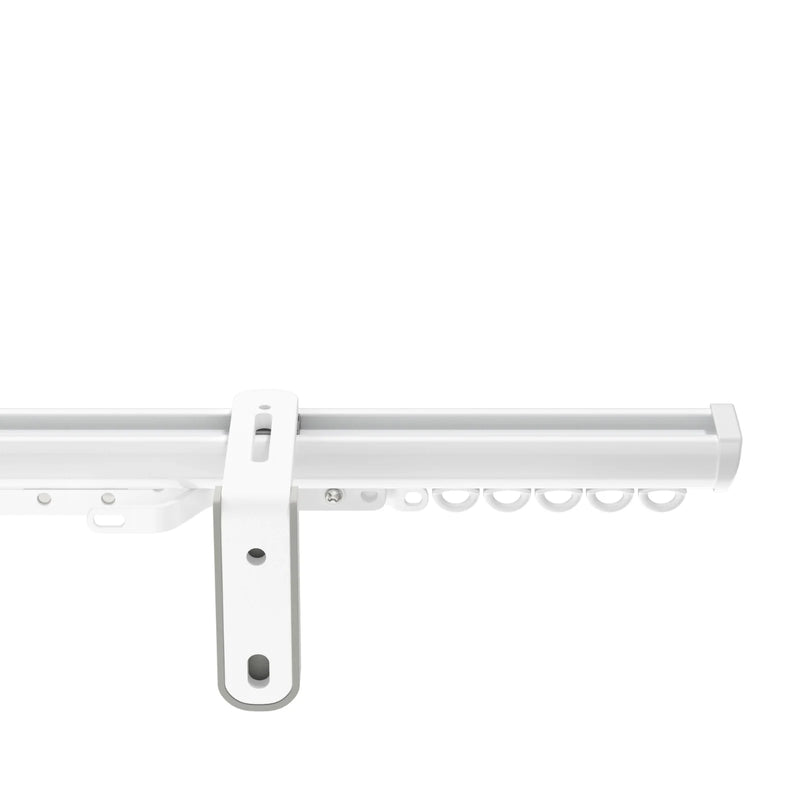 White aluminum curtain track system with a central mounting bracket and a line of D-shaped gliders
