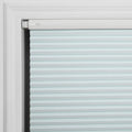 Light blue cellular window Blind installed within a white window frame featuring horizontal pleats and a white top-down mechanism with a small oval button