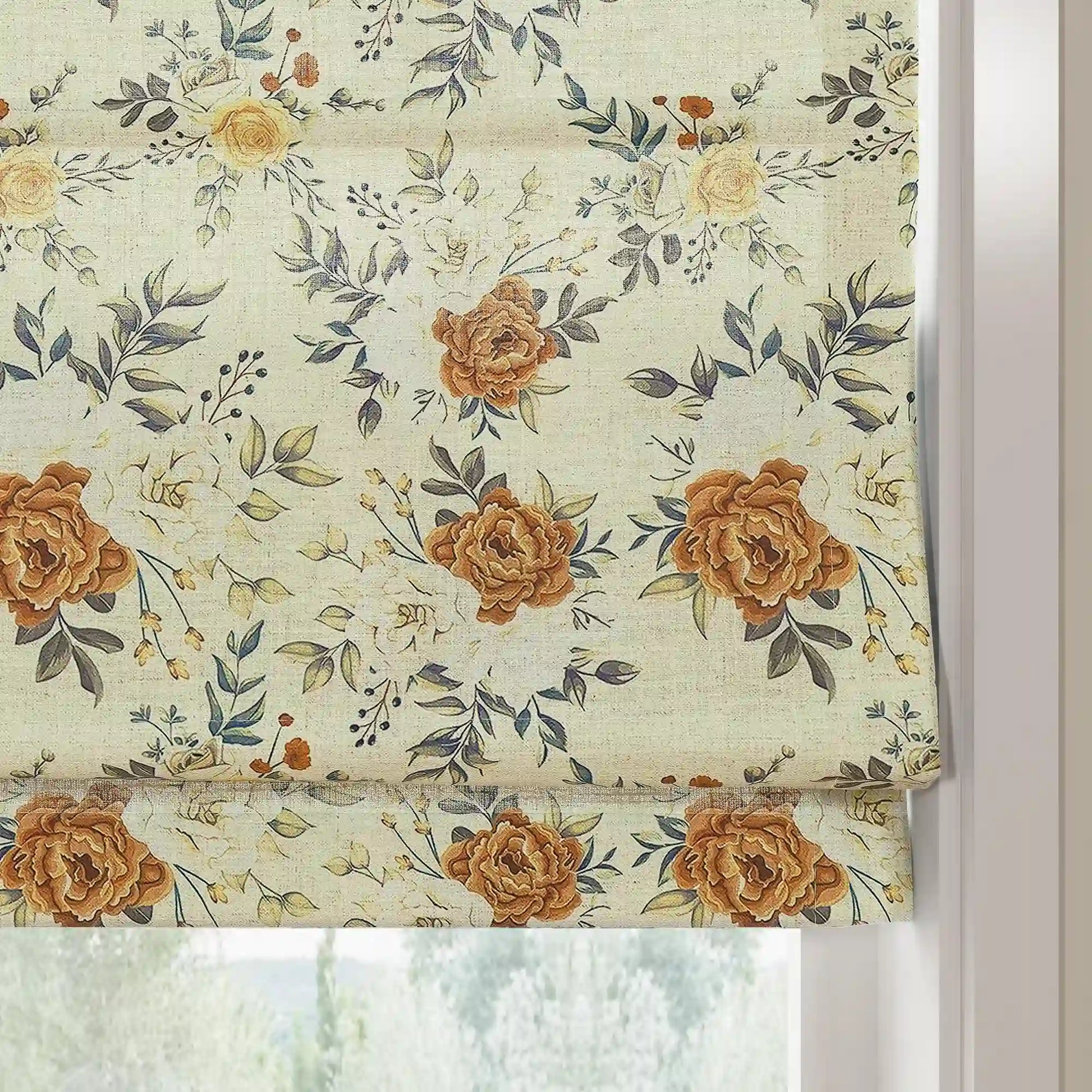 Fabric photo of a patterned Roman blind featuring warm brown roses, delicate pale yellow blossoms, and elegant dark green leaves on a light cream textured fabric against a white window frame