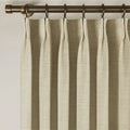 Light Khaki Liz Linen Pleated Curtains triple pinch pleat heading on a bronze curtain rod