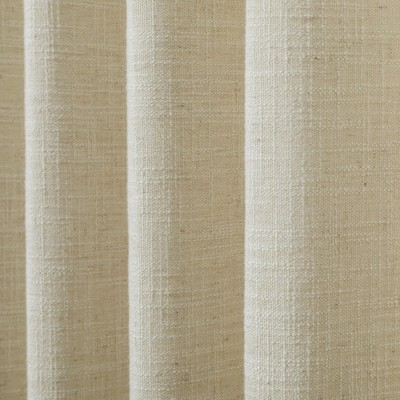Light Khaki Liz Linen Pleated Curtains semi-sheer linen weave shown in vertical folds
