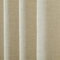 Close-up of light beige textured woven fabric with distinct vertical folds and natural fiber details