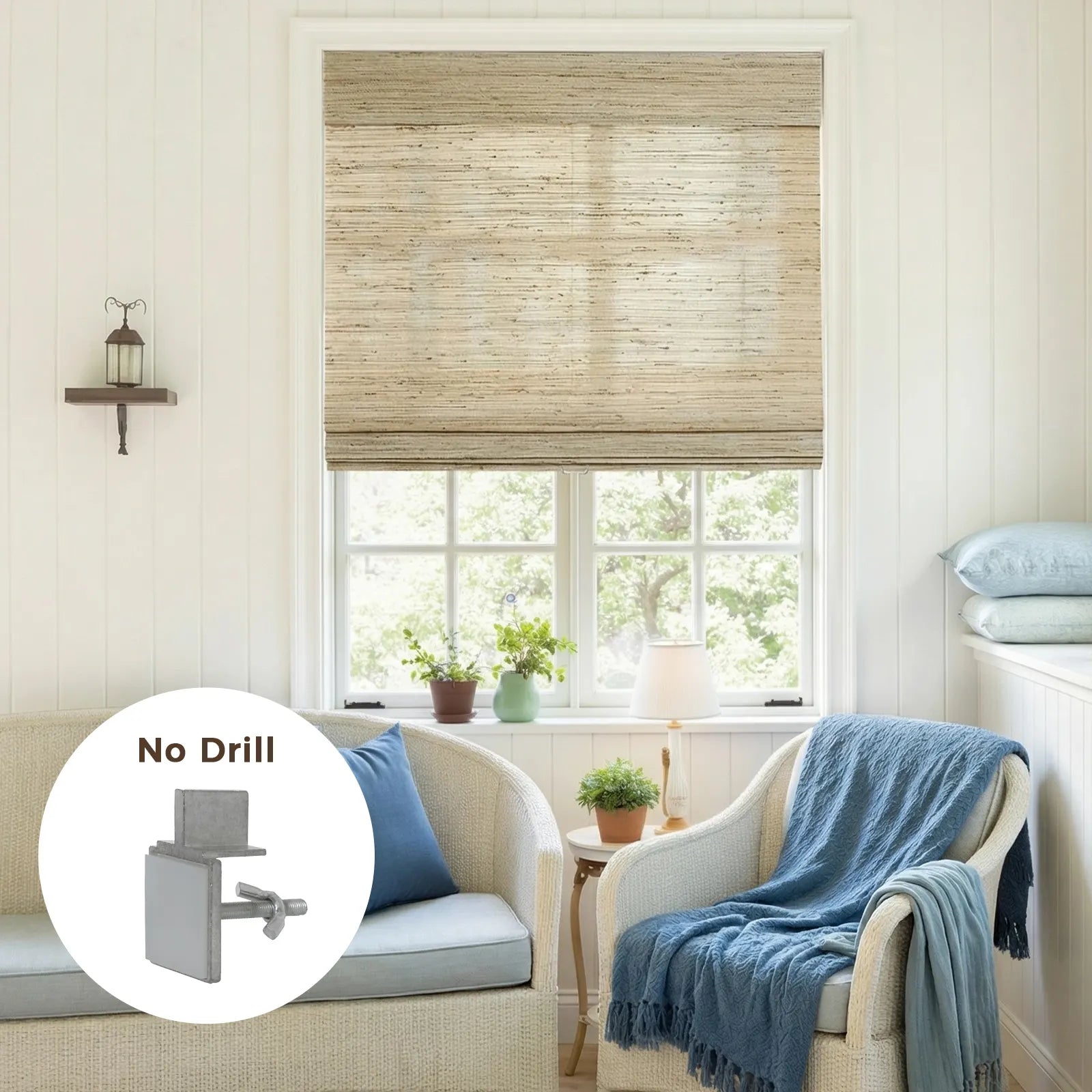 A cozy interior room features a natural textured Roman blind over a large window, complemented by white paneled walls, wicker furniture with blue cushions and a throw, and an overlay showcasing a functional "No Drill" bracket