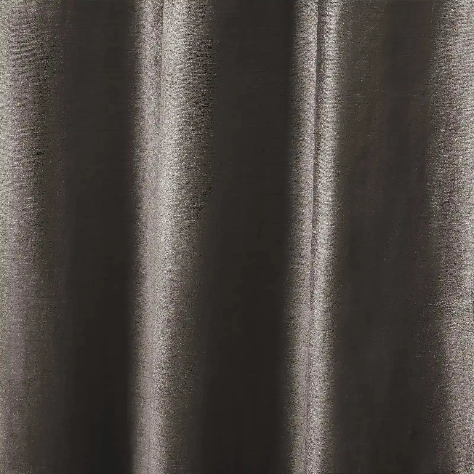 Close-up photograph of a shimmering dark taupe fabric with a subtle horizontal woven texture and soft vertical drapes creating luminous highlights and deep shadows