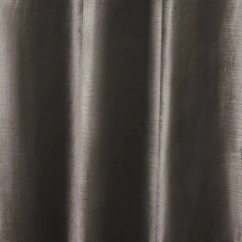 Close-up photograph of a shimmering dark taupe fabric with a subtle horizontal woven texture and soft vertical drapes creating luminous highlights and deep shadows