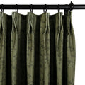 A richly textured olive green curtain panel featuring a subtle dark floral vine pattern suspended from a black metal rod with rings