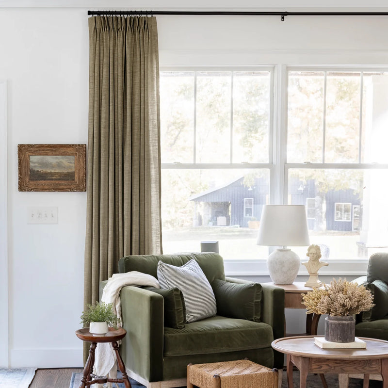 Oak Dim Gray Liz Linen Pleated Curtains beside a green sofa and dried-flower coffee-table arrangement