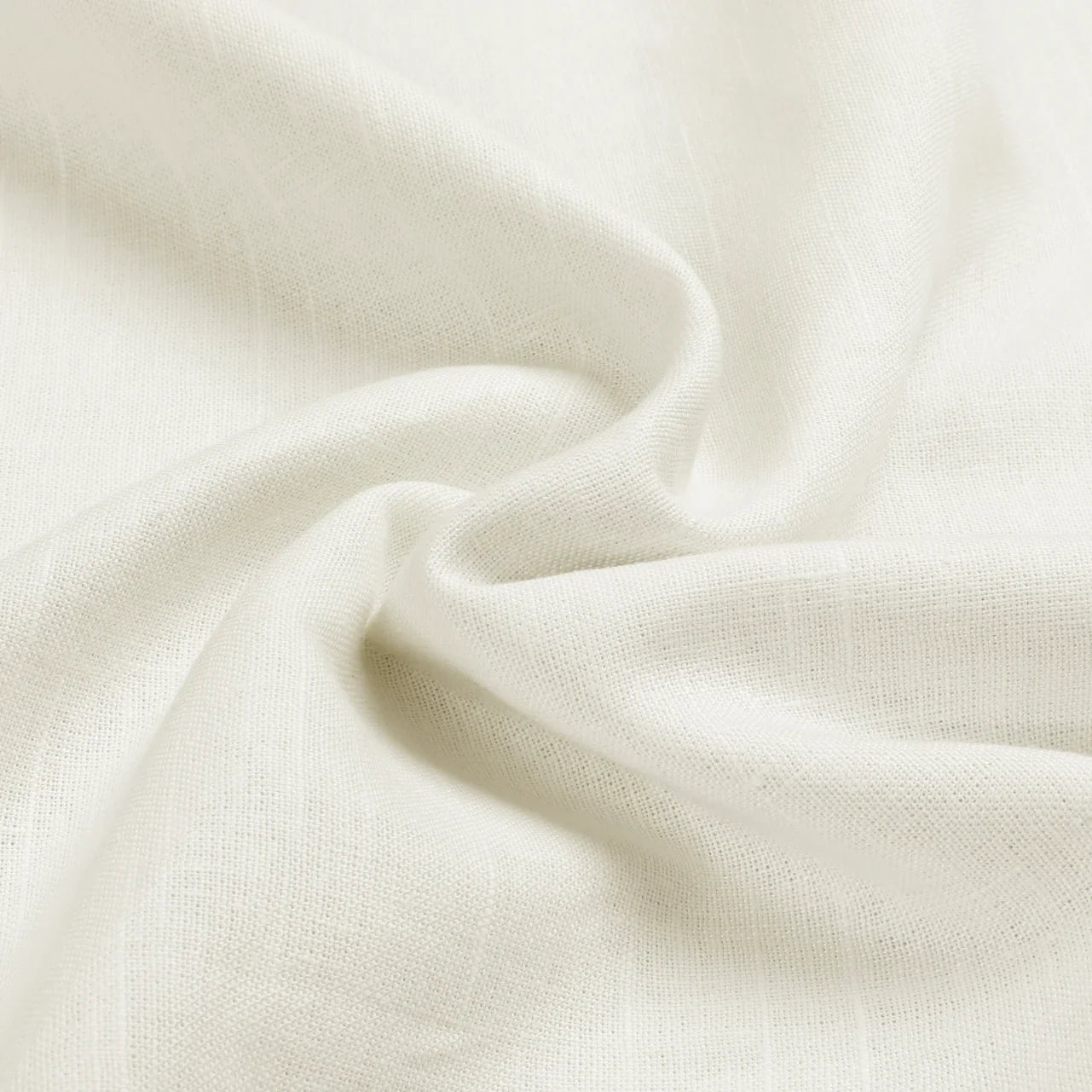 Off-white woven fabric in a creamy white color featuring a textured surface and soft, elegant drapery