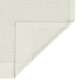 Light beige woven fabric with a subtle grid pattern and a neatly folded corner showcasing its texture