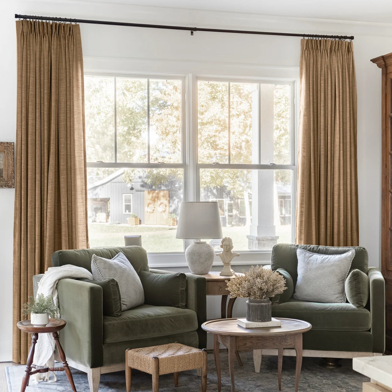 Orange Copper Liz linen curtains framing a bright window in a balanced full-length interior view