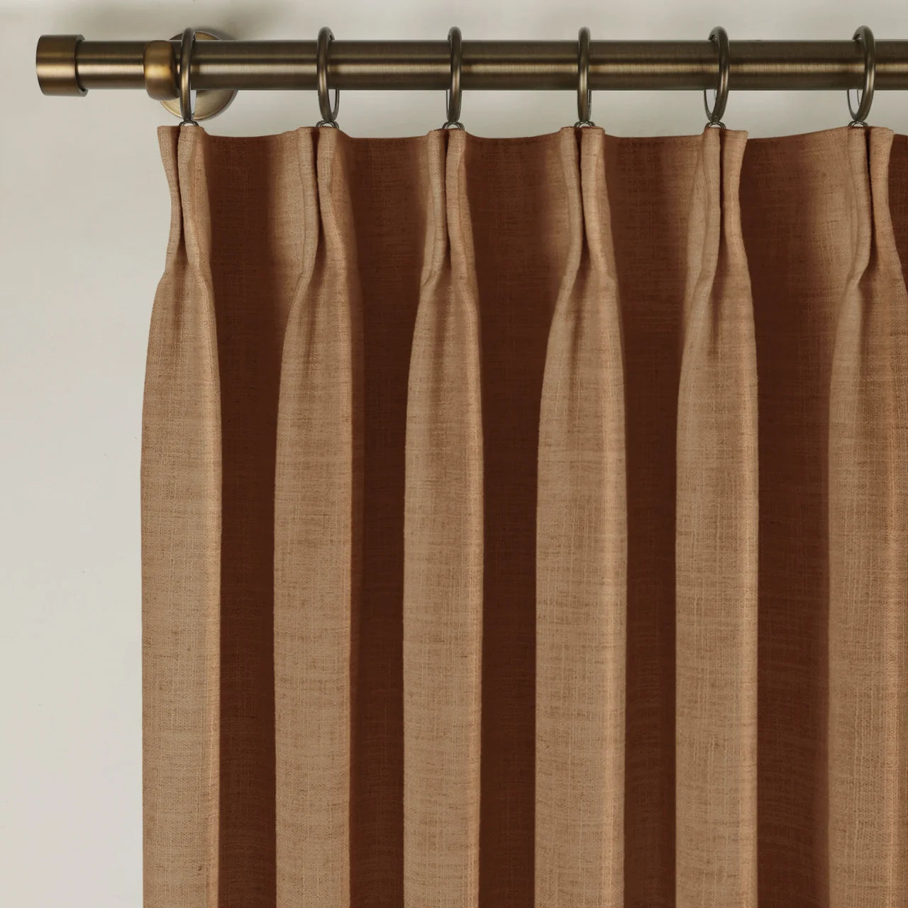 Orange Copper Liz linen curtains in a close room detail highlighting the linen texture and colour