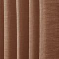 Orange Copper Liz linen curtains in a wider lifestyle scene with furnishings and softly flowing folds