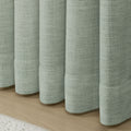 Pale Blue Aqua Liz linen curtains in a close room detail highlighting the linen texture and colour