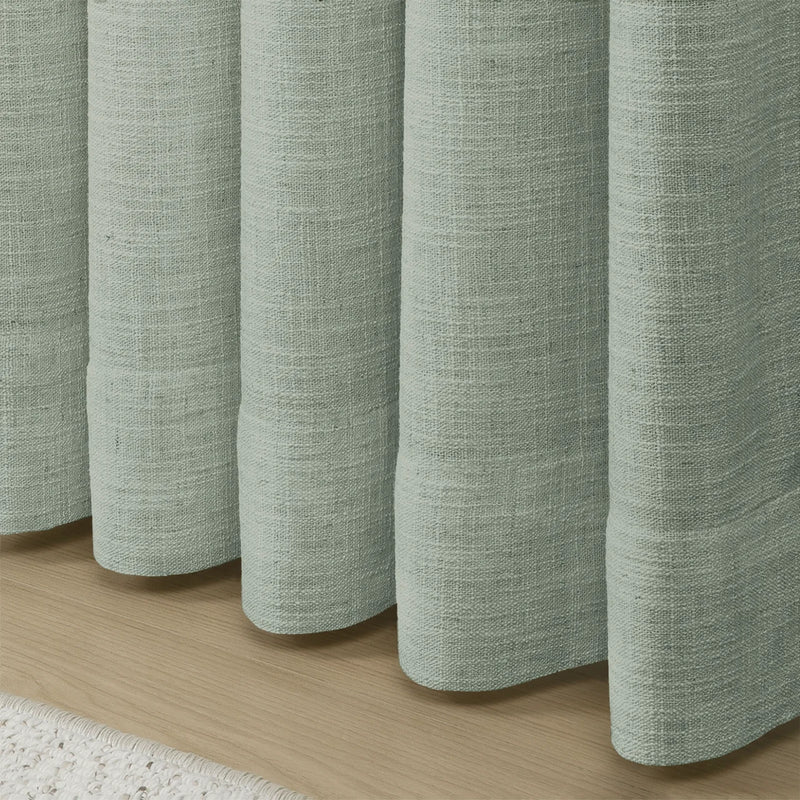 Pale Blue Aqua Liz linen curtains in a close room detail highlighting the linen texture and colour