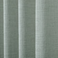 Pale Blue Aqua Liz linen curtains drawn partly across the window with filtered light revealing the weave
