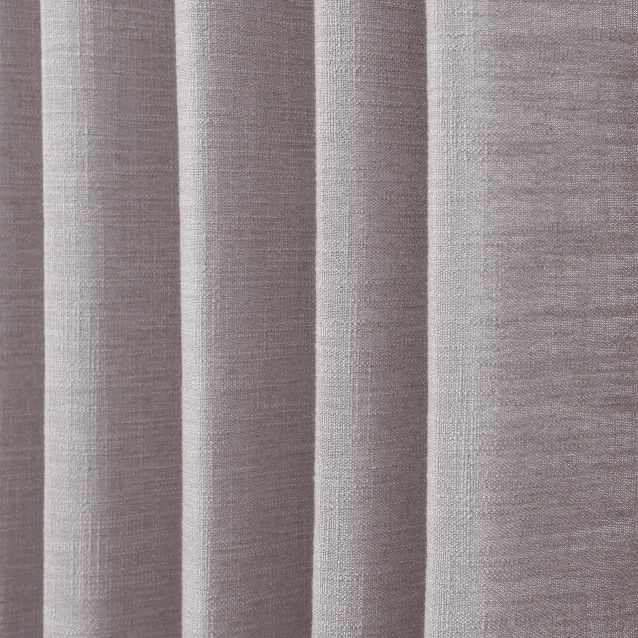 Parchment Liz linen curtains in a close room detail highlighting the linen texture and colour