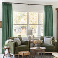 Peacock Liz linen curtains framing a bright window in a balanced full-length interior view