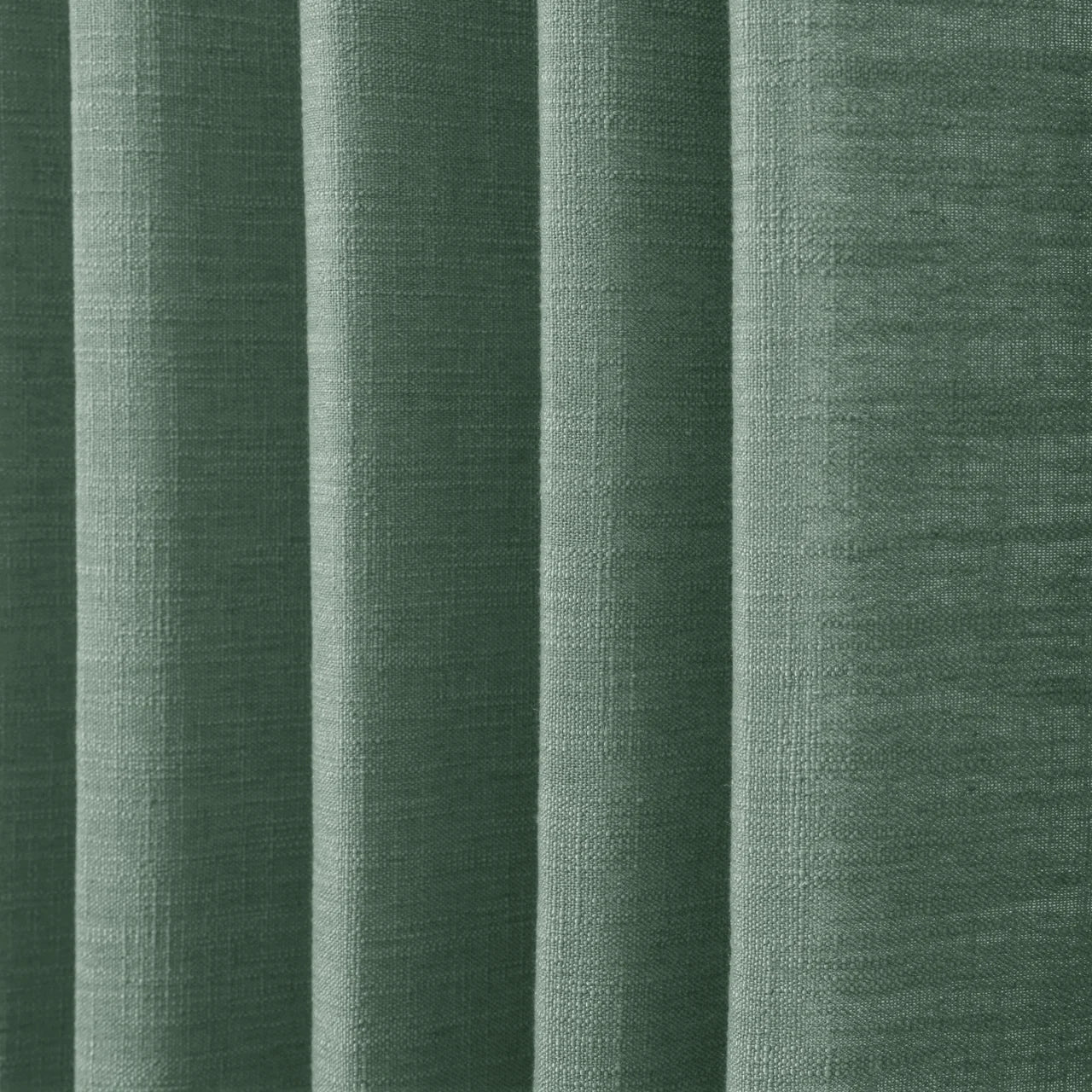 Peacock Liz linen curtains in a close room detail highlighting the linen texture and colour