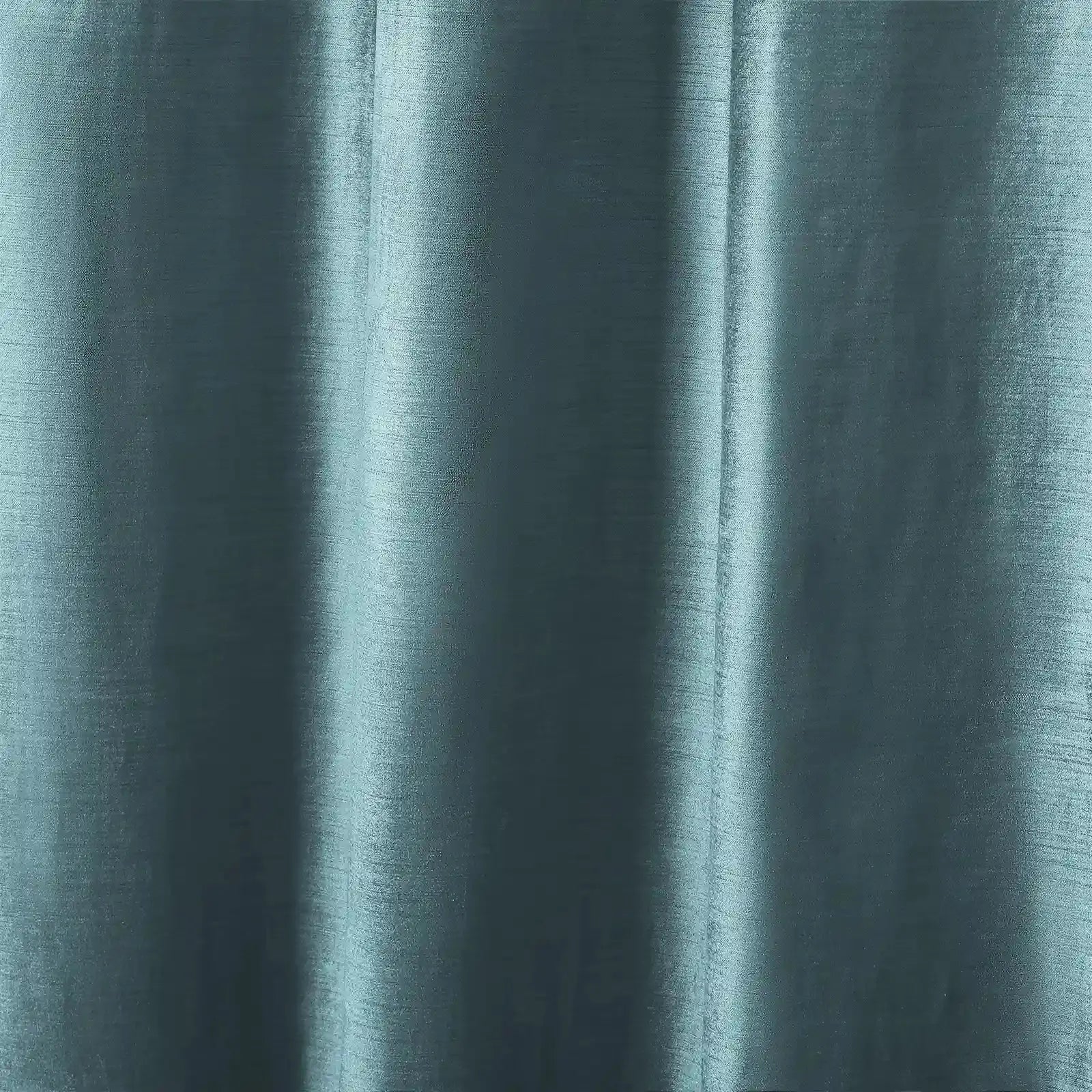 Textile, a close-up of muted teal fabric with a subtle silky sheen, draped in soft vertical folds highlighting its fine thread texture