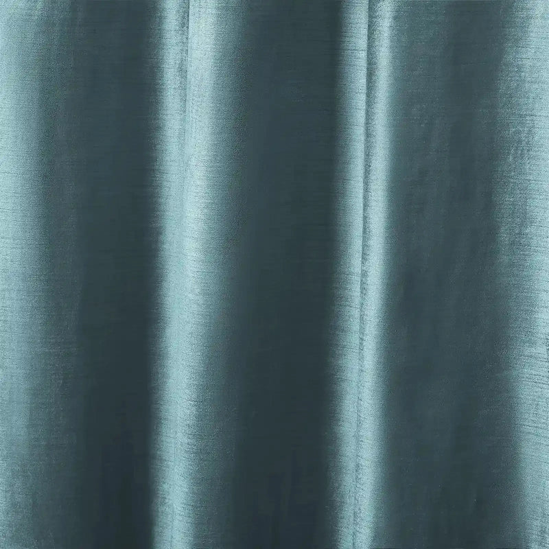 Textile, a close-up of muted teal fabric with a subtle silky sheen, draped in soft vertical folds highlighting its fine thread texture
