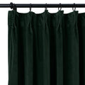 Forest green velvet curtain with lush pleated texture hanging from a black metal rod with rings