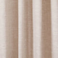 Close-up photograph of a light beige textured linen curtain featuring soft vertical drapes and a subtle central seam