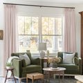 Pink Lemonade Liz linen curtains framing a bright window in a balanced full-length interior view