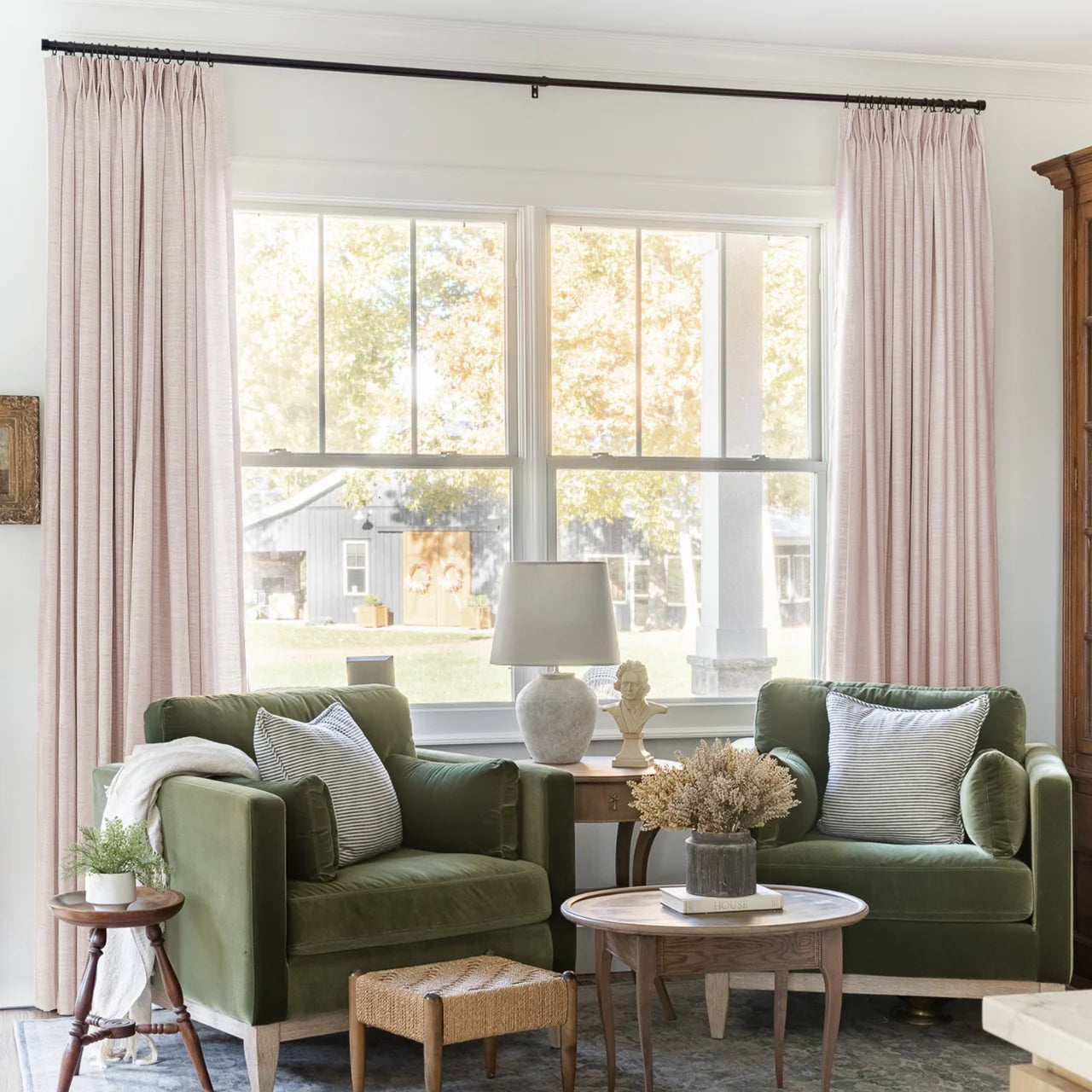 Pink Lemonade Liz linen curtains framing a bright window in a balanced full-length interior view