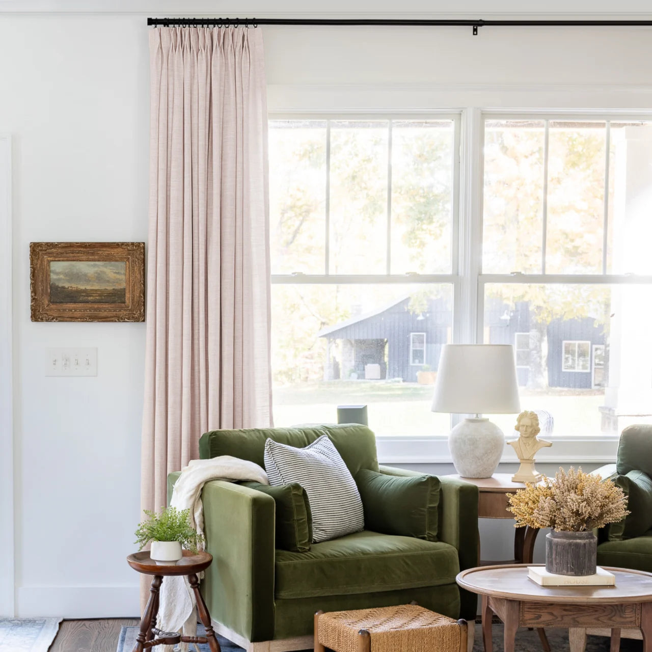 Pink Lemonade Liz linen curtains shown closer beside a sunlit window with smooth vertical folds
