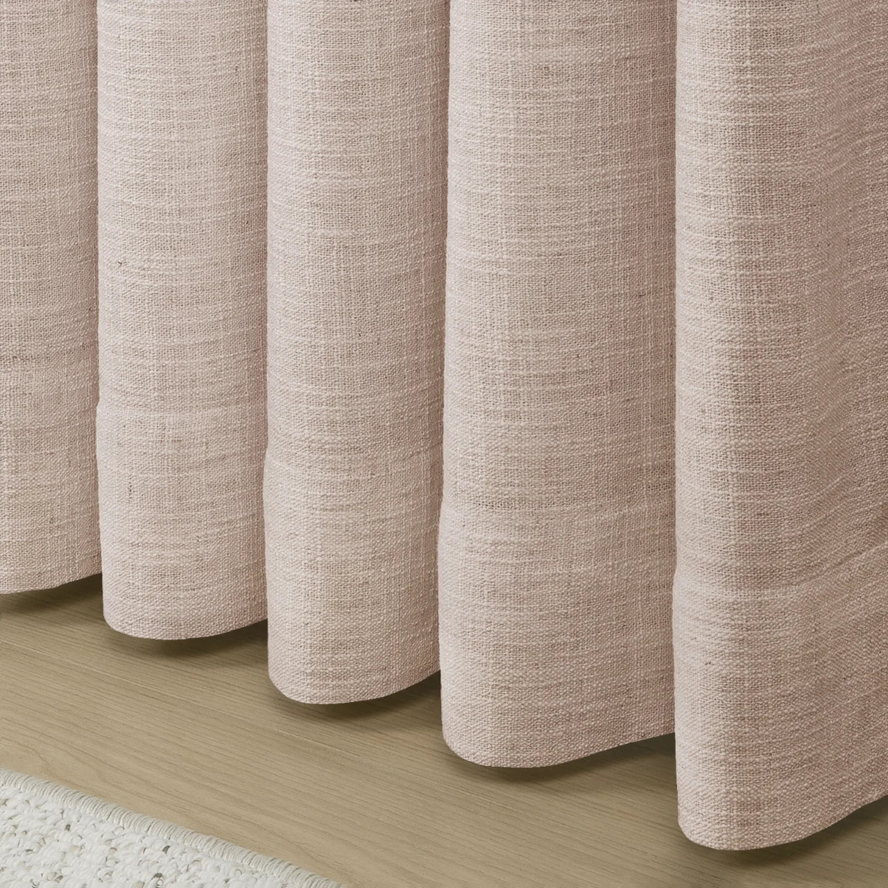 Pink Lemonade Liz linen curtains in a close room detail highlighting the linen texture and colour