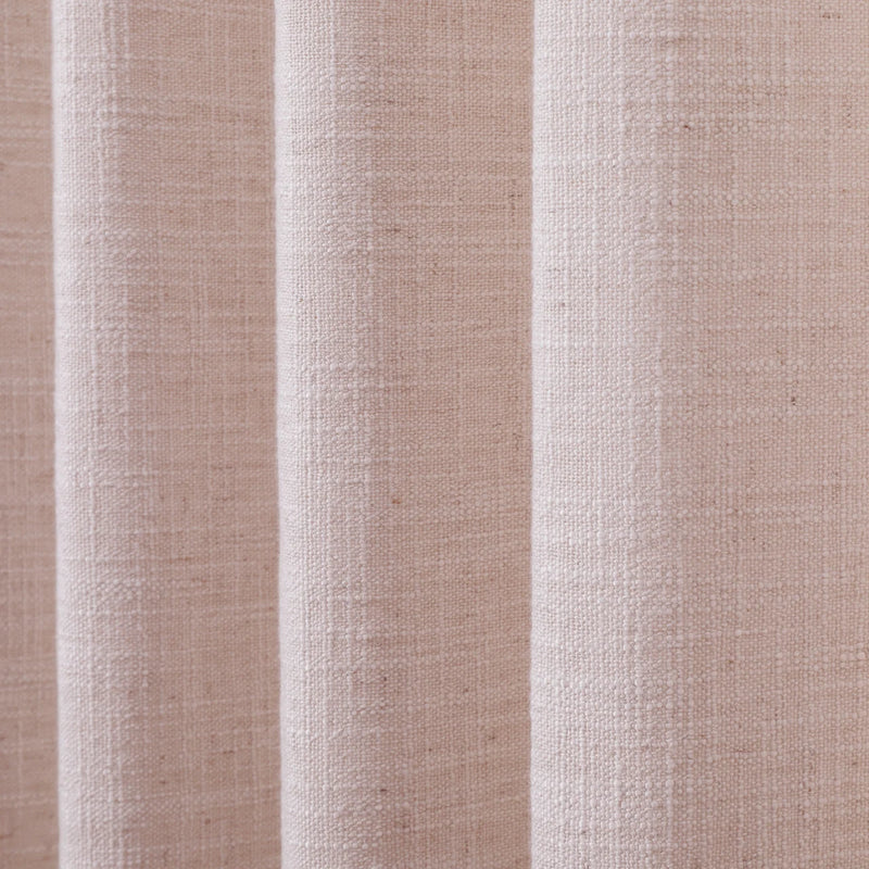 Pink Lemonade Liz linen curtains drawn partly across the window with filtered light revealing the weave
